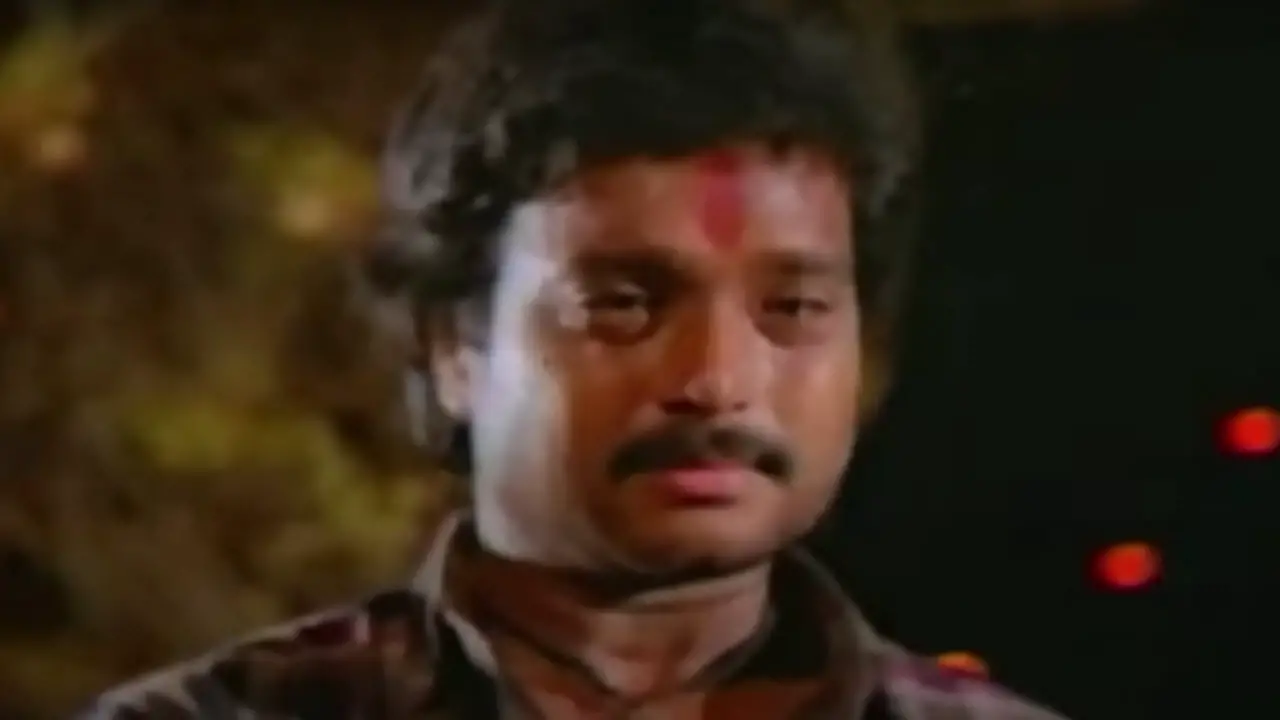 பாடிப் பறந்த கிளி